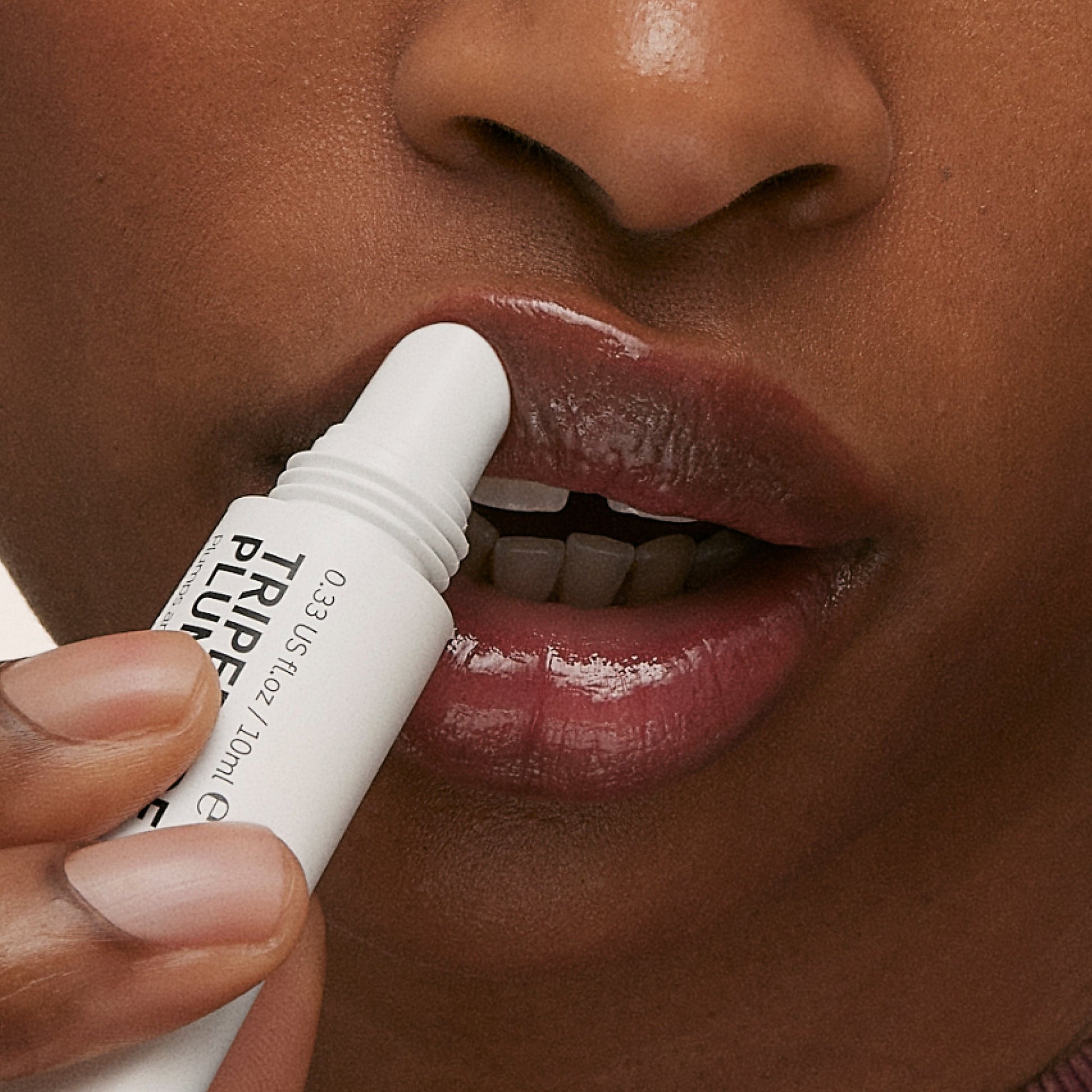 tripeptide-plumping-berry-lip-balm-c6 ApplicationBerry.jpg